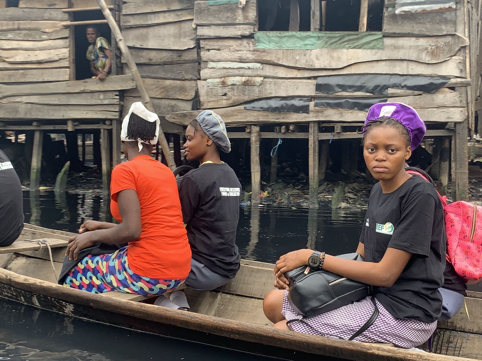 Getting around Makoko. Our team travelling between homes by canoe.